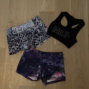 Set of two shorts and one matching sports bra from I am Becoming